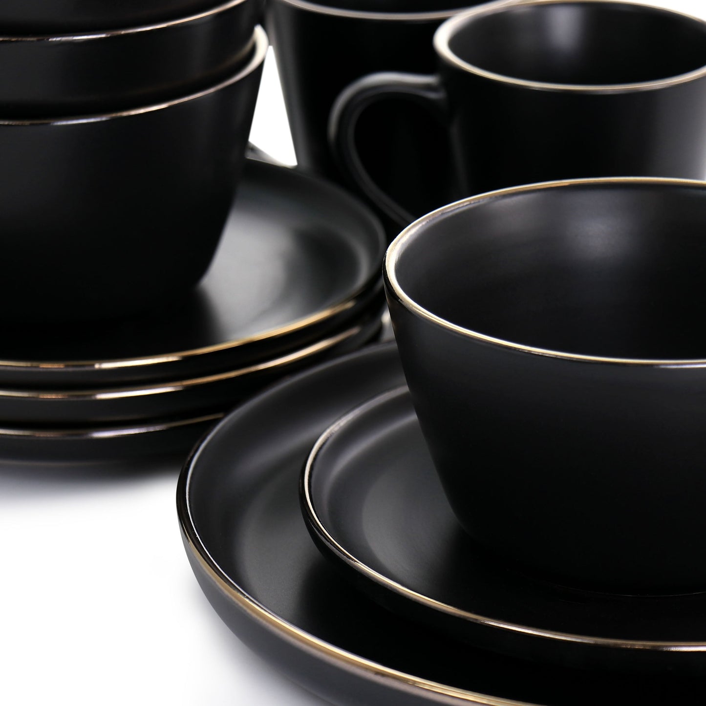 Service de table 16 pièces en grès noir avec bordure dorée
