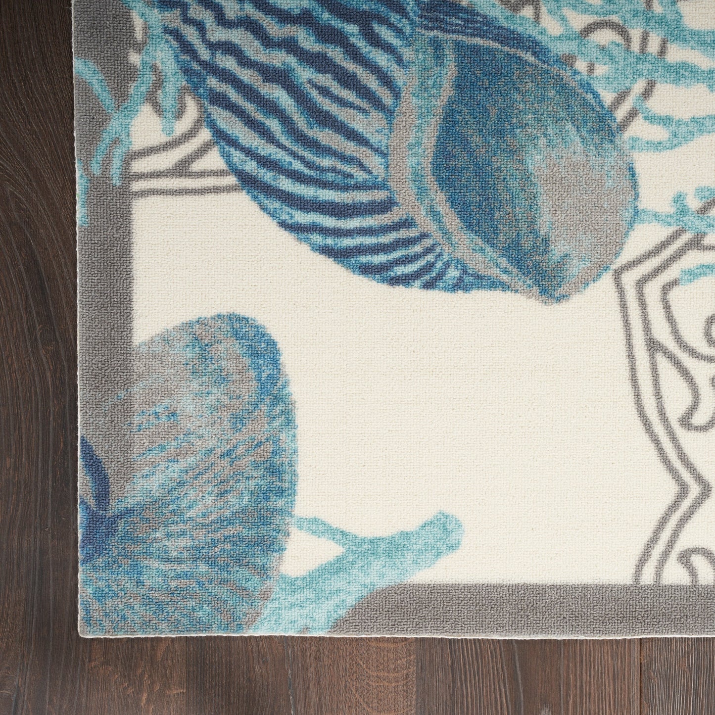 Tapis d'intérieur et d'extérieur Waverly Sun & Shade Shore Thing à motif de coquillages tropicaux et floraux