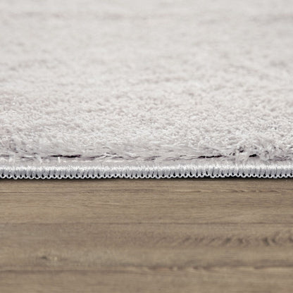 Tapis doux et lavable avec envers antidérapant, couleurs unies