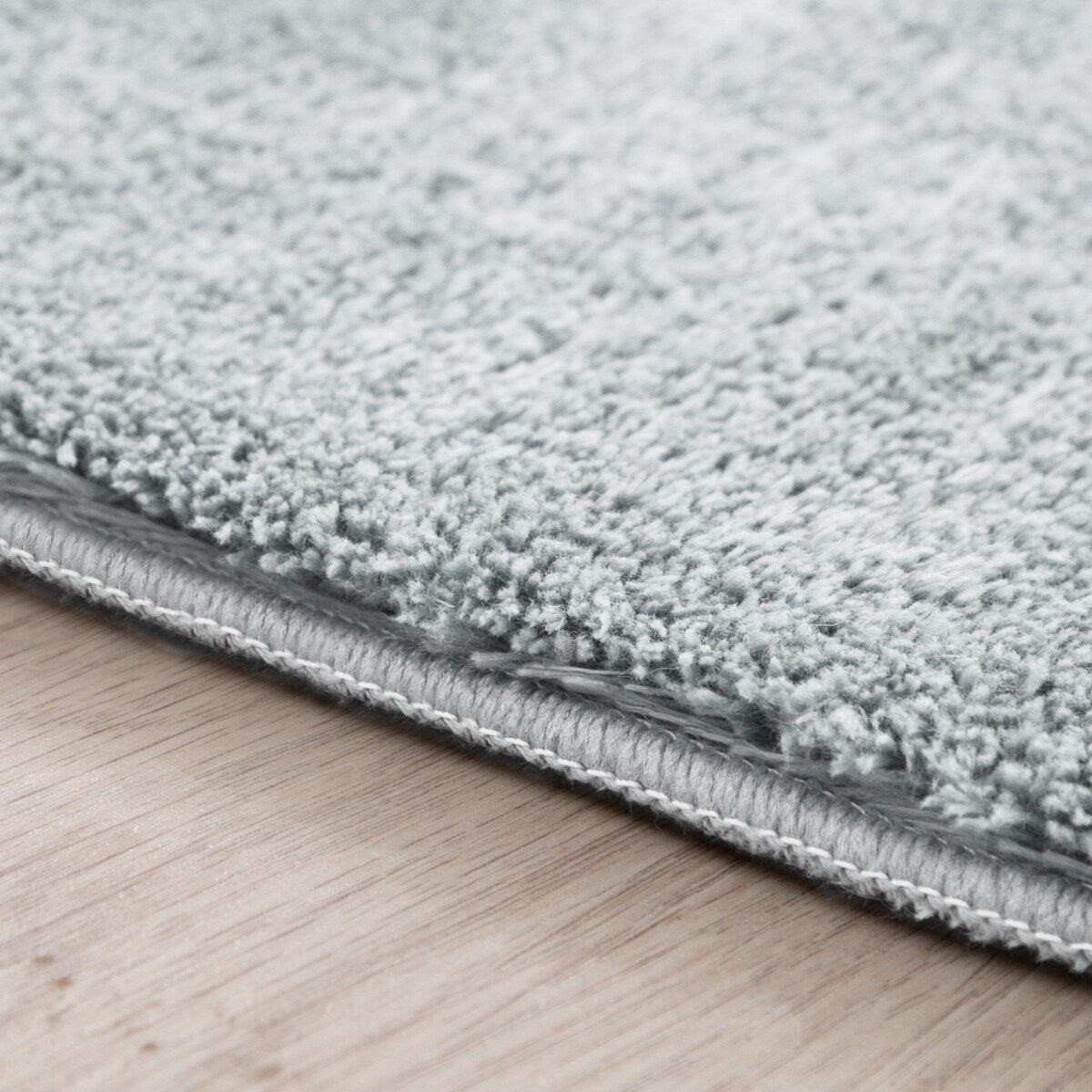 Tapis doux et lavable avec envers antidérapant, couleurs unies