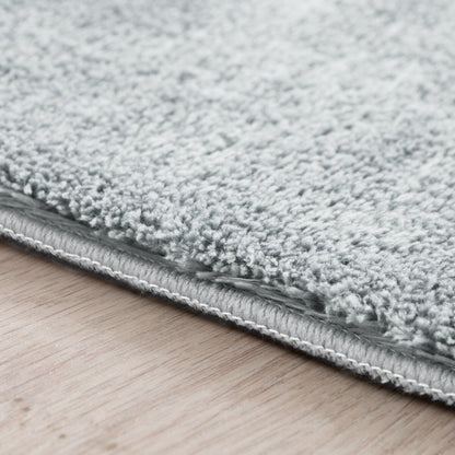 Tapis doux et lavable avec envers antidérapant, couleurs unies