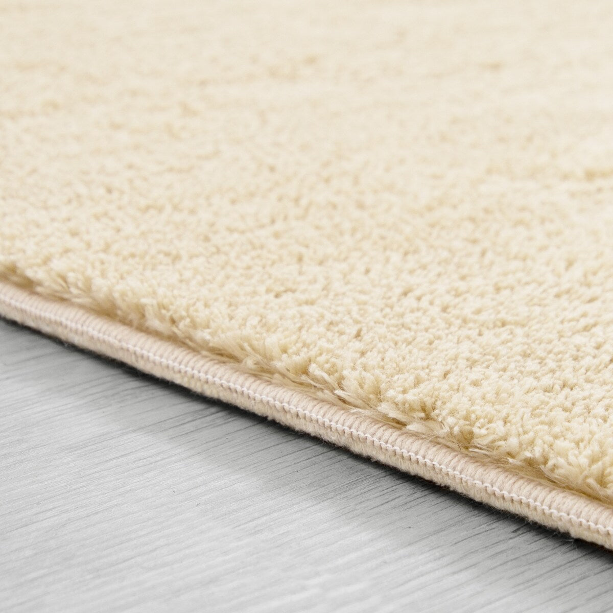 Tapis doux et lavable avec envers antidérapant, couleurs unies