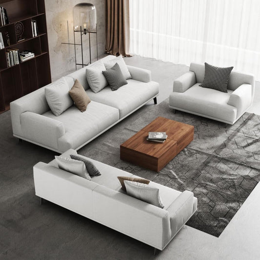 Canapé droit en tissu beige avec accoudoirs carrés