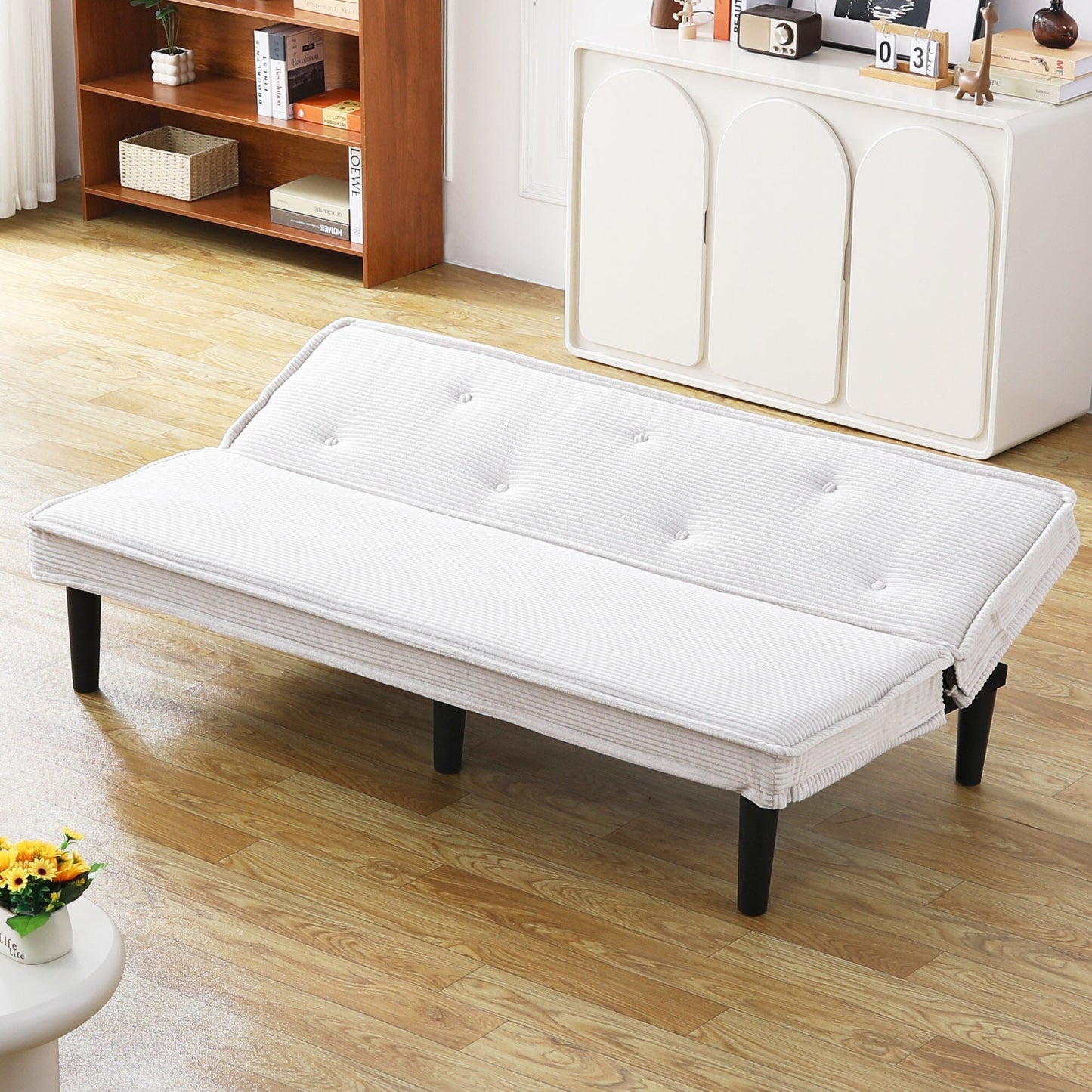 This 66-inch corduroy sofa bed can switch between the two comfortable forms
