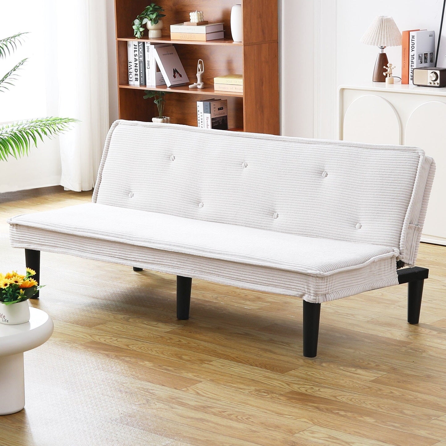 This 66-inch corduroy sofa bed can switch between the two comfortable forms