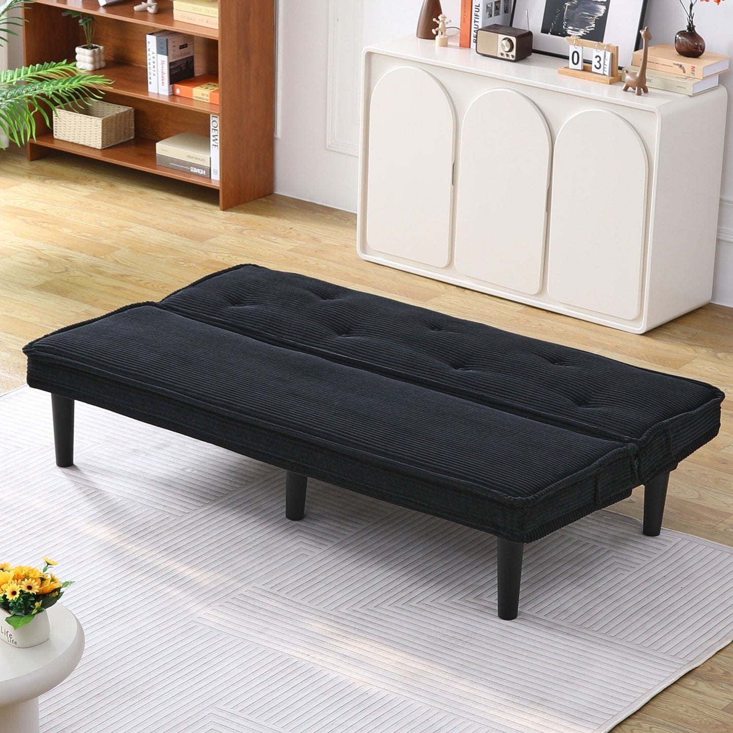 This 66-inch corduroy sofa bed can switch between the two comfortable forms
