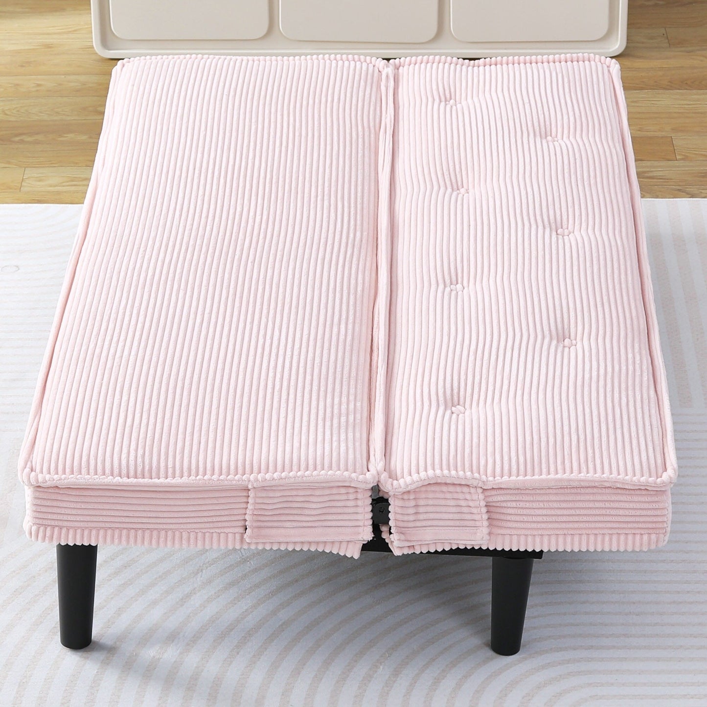 This 66-inch corduroy sofa bed can switch between the two comfortable forms