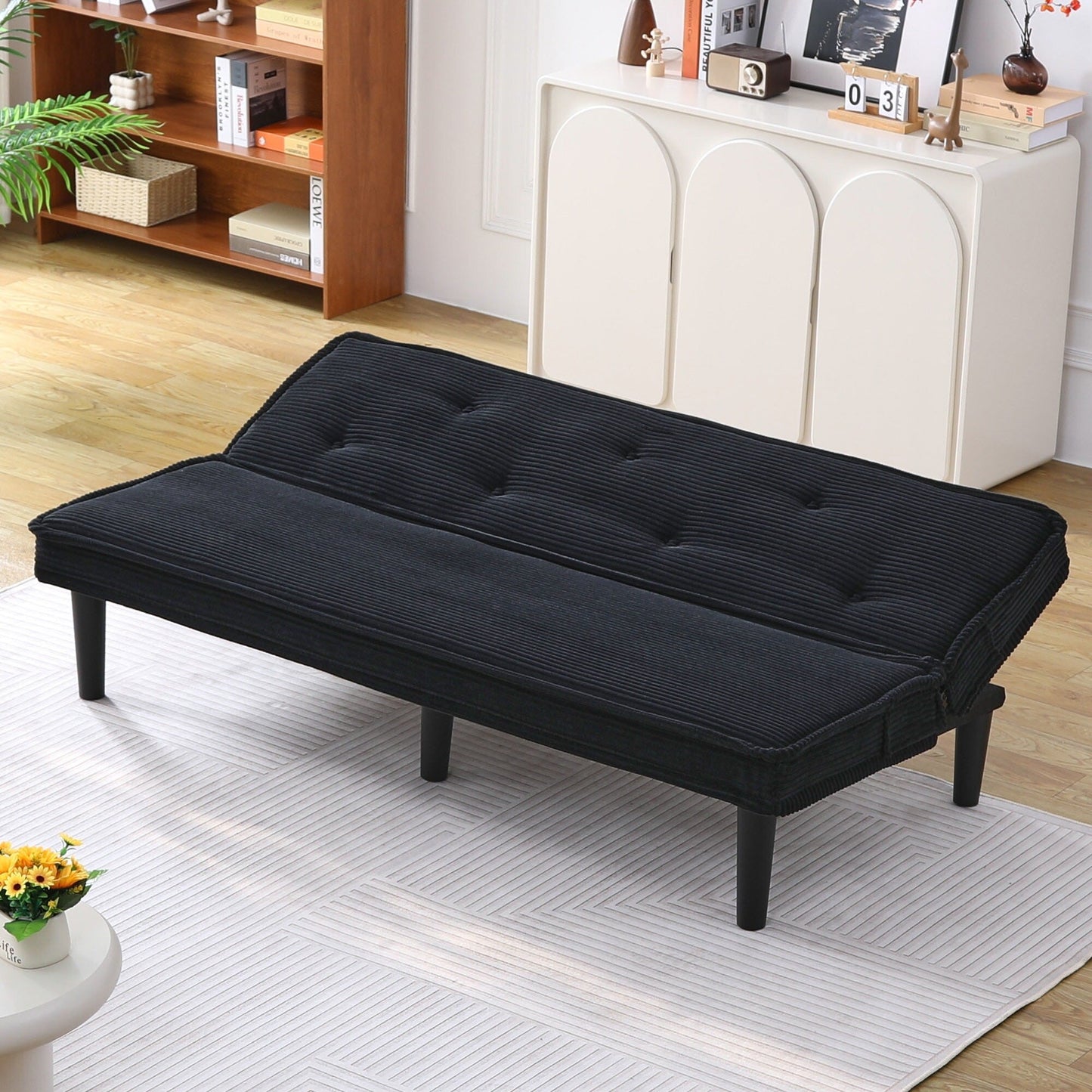 This 66-inch corduroy sofa bed can switch between the two comfortable forms