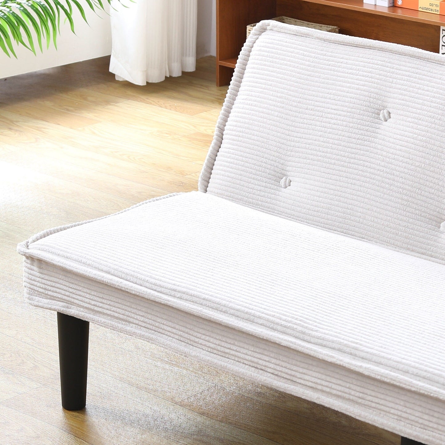 This 66-inch corduroy sofa bed can switch between the two comfortable forms
