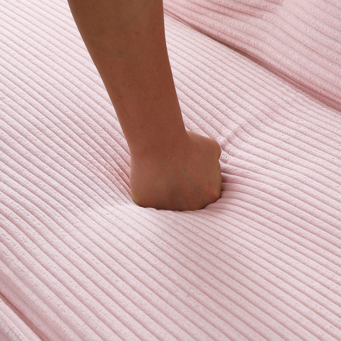 This 66-inch corduroy sofa bed can switch between the two comfortable forms