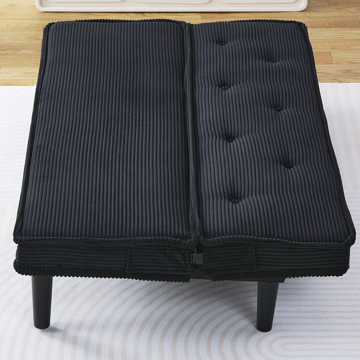This 66-inch corduroy sofa bed can switch between the two comfortable forms