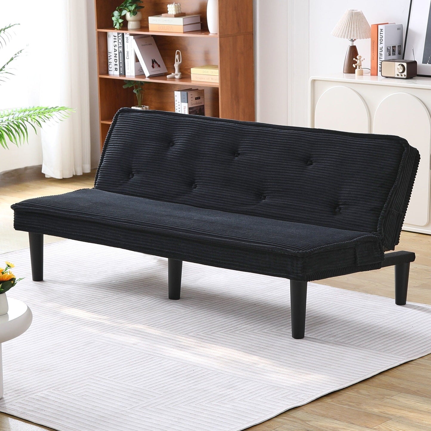 This 66-inch corduroy sofa bed can switch between the two comfortable forms