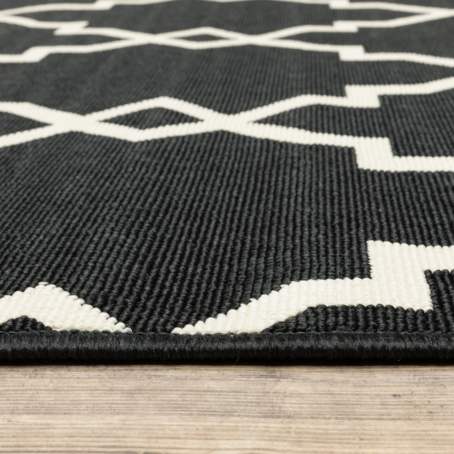 Tapis d'intérieur et d'extérieur Vista Home Malta Lattice noir/blanc cassé.
