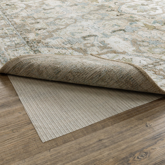 Sous-tapis Vista Home Sure Hold en polyester tricoté avec revêtement en PVC blanc - Blanc cassé