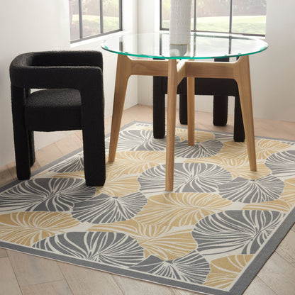 Tapis d'intérieur/extérieur moderne botanique Waverly Sun N' Shade