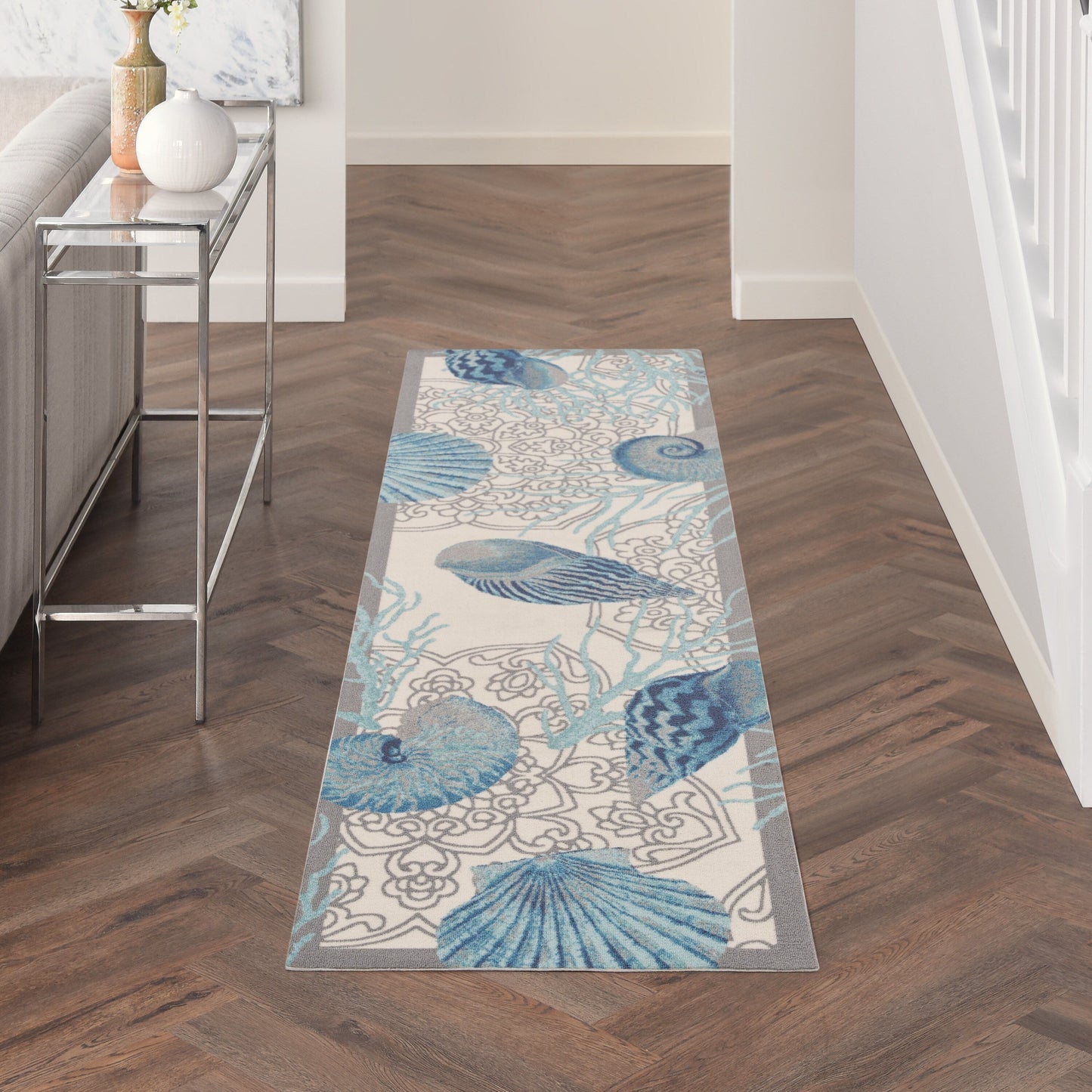 Tapis d'intérieur et d'extérieur Waverly Sun &amp; Shade Shore Thing à motif de coquillages tropicaux et floraux