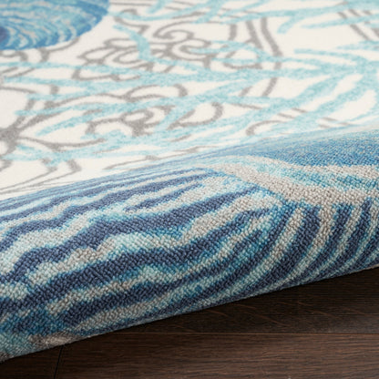 Tapis d'intérieur et d'extérieur Waverly Sun &amp; Shade Shore Thing à motif de coquillages tropicaux et floraux