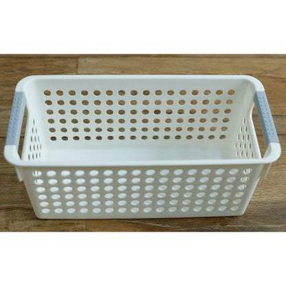Panier de rangement rectangulaire en plastique blanc avec poignées