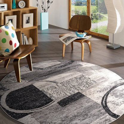 Tapis circulaire abstrait en polypropylène fabriqué à la machine, de la World Rug Gallery