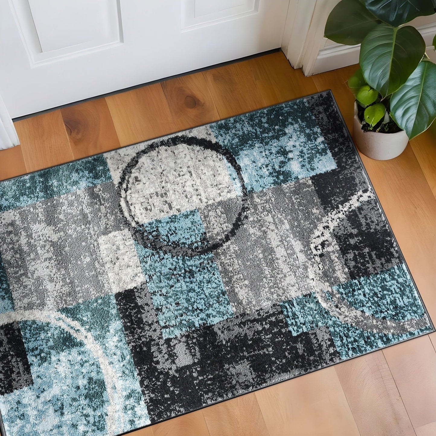 Tapis circulaire abstrait en polypropylène fabriqué à la machine, de la World Rug Gallery