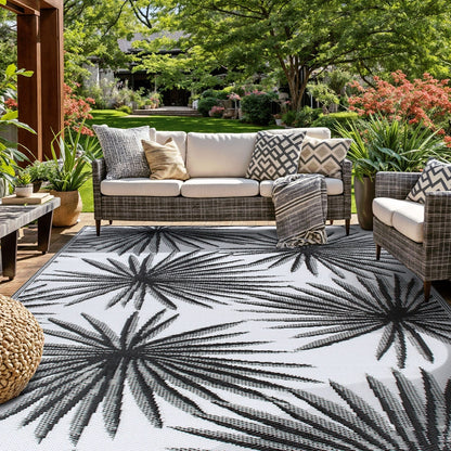 Tapis d'extérieur réversibles en plastique recyclé à motifs floraux tropicaux de la World Rug Gallery